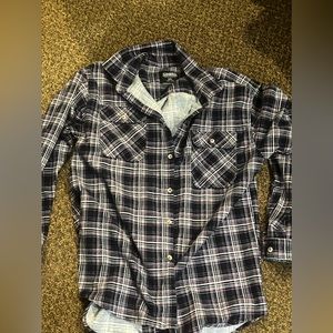 Lowes purple flannel XL fits more like Large